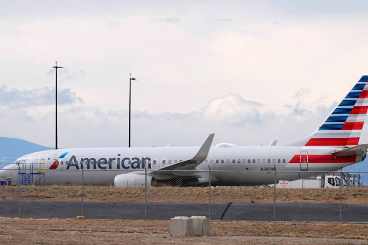 An American Airlines jetliner is seen in Denver on Friday, March 14, 2025. (AP Photo/David Zalu ...