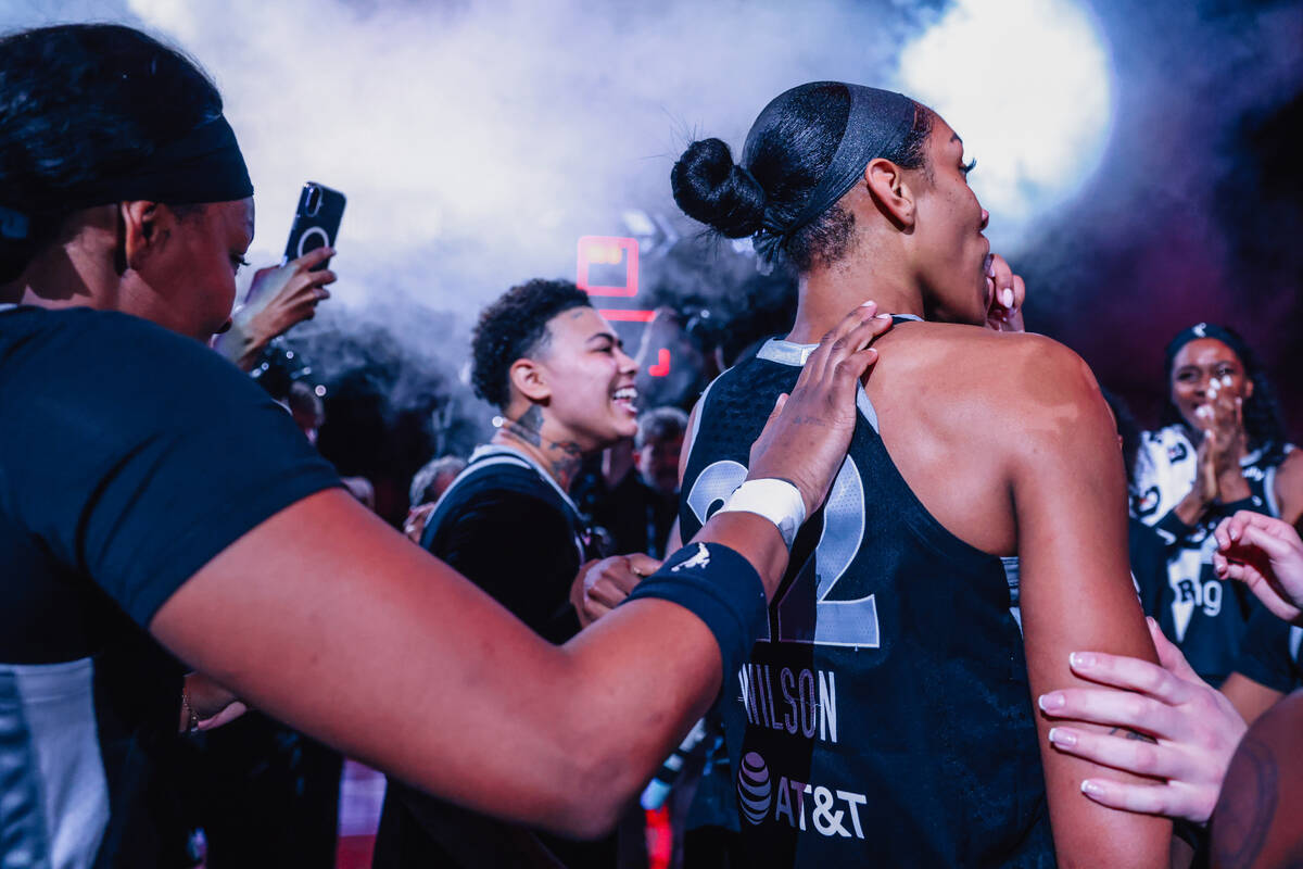 The Aces celebrate winning game three of a first round WNBA playoff basketball game between the ...
