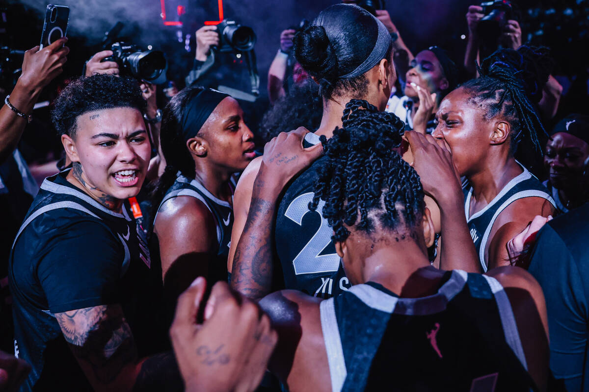 The Aces celebrate winning game three of a first round WNBA playoff basketball game between the ...