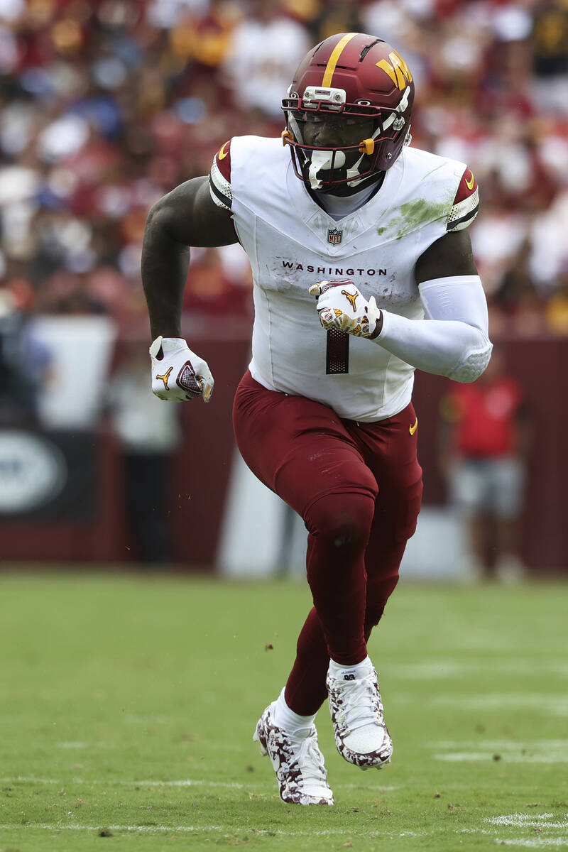 Washington Commanders wide receiver Deebo Samuel (1) runs a route during an NFL football game a ...