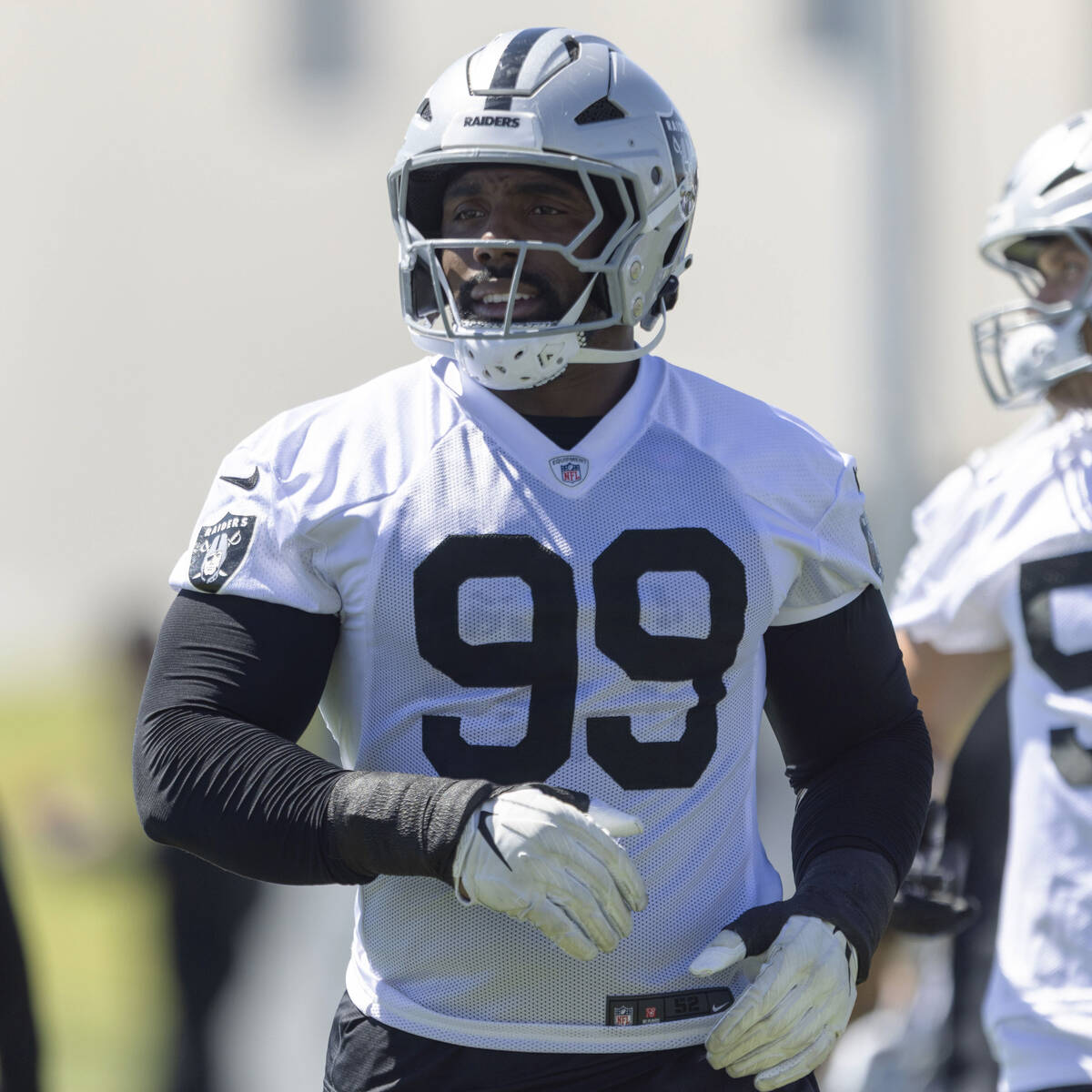 Raiders defensive tackle Thomas Booker IV (99) jogs during the team’s practice at the In ...