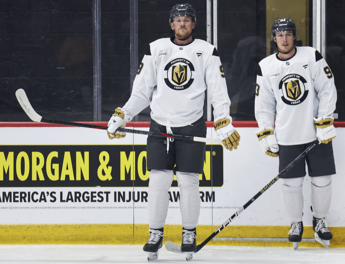 Golden Knights center Jack Eichel (9) and right wing Mitch Marner (93) participate in practice ...