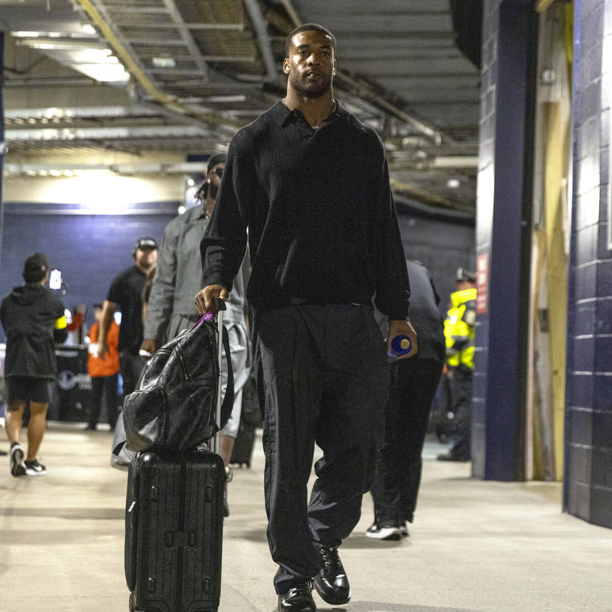Raiders safety Jeremy Chinn arrives at Gillette Stadium before an NFL game against the New Engl ...