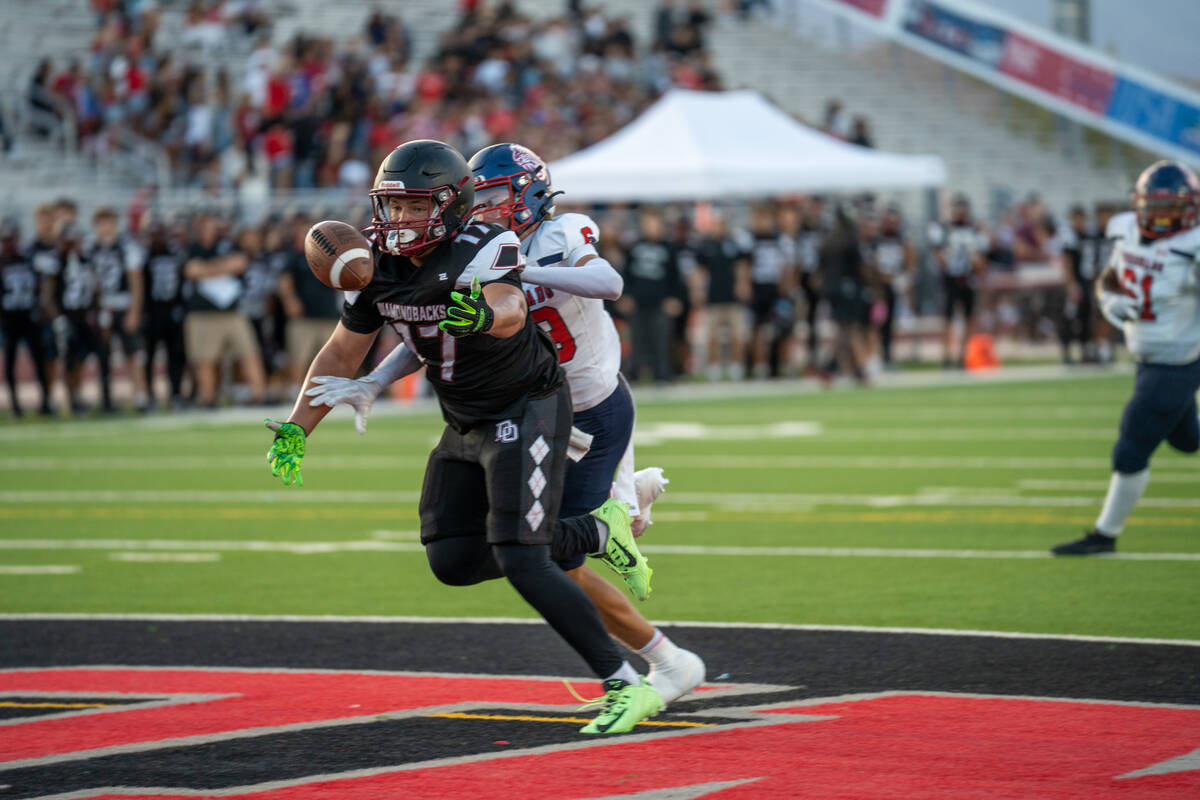 Desert Oasis Andrew Richmond (17) catches the ball for a touchdown during a football game again ...