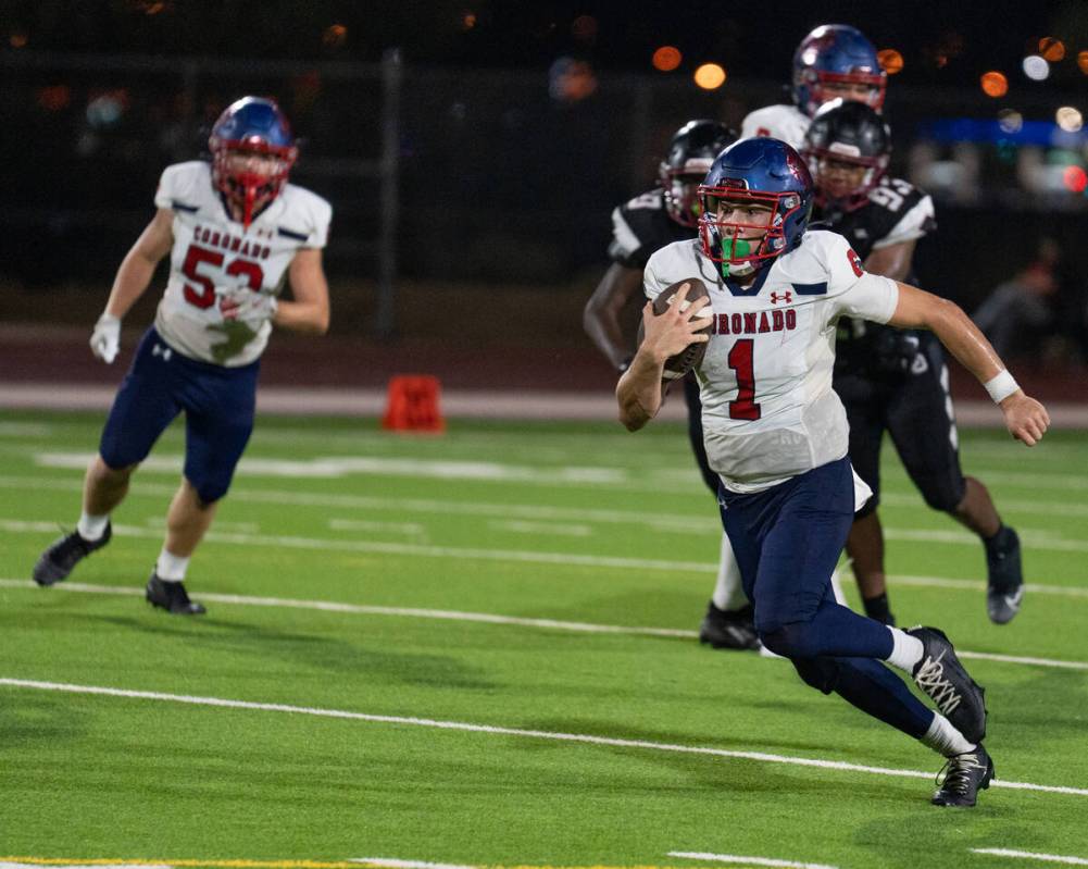 Coronado’s quarterback Jackson Humphries (1) breaks away during a football game against ...