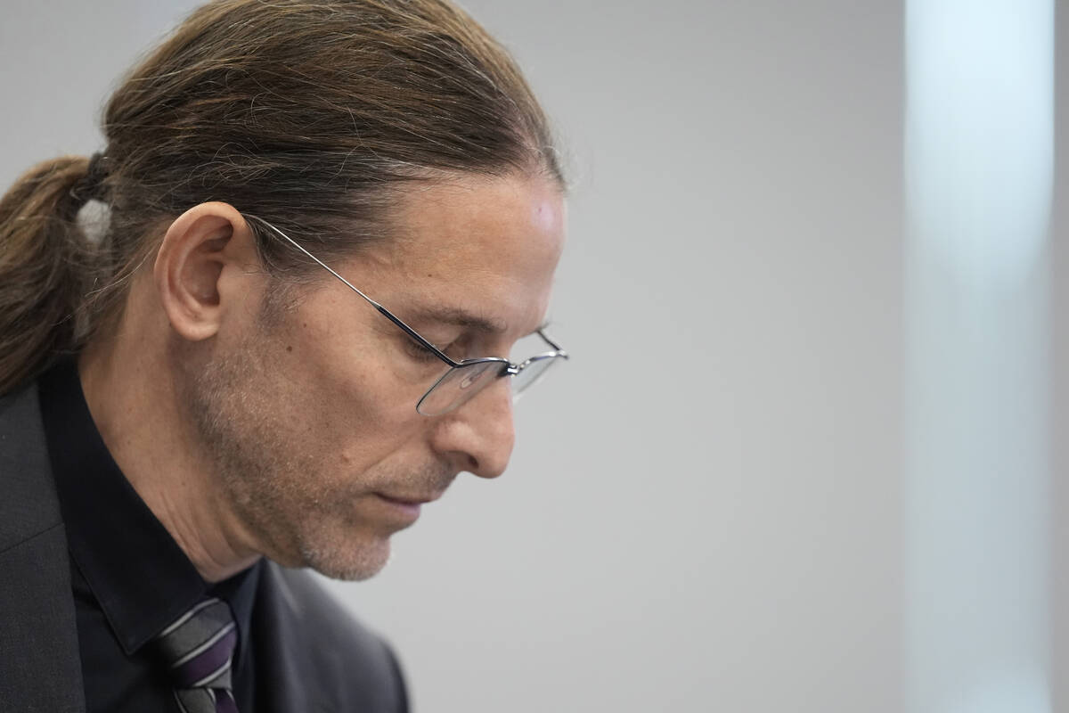 Committee member Dr. Retsef Levi listens during a meeting of the Advisory Committee on Immuniza ...