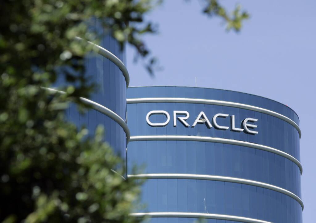 FILE - The exterior of Oracle Corp. headquarters is pictured in Redwood City, Calif., June 26, ...