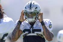 Raiders cornerback Decamerion Richardson (25) adjusts his helmet during the team’s pract ...