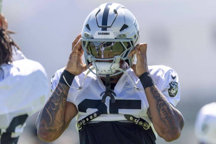 Raiders cornerback Decamerion Richardson (25) adjusts his helmet during the team’s pract ...