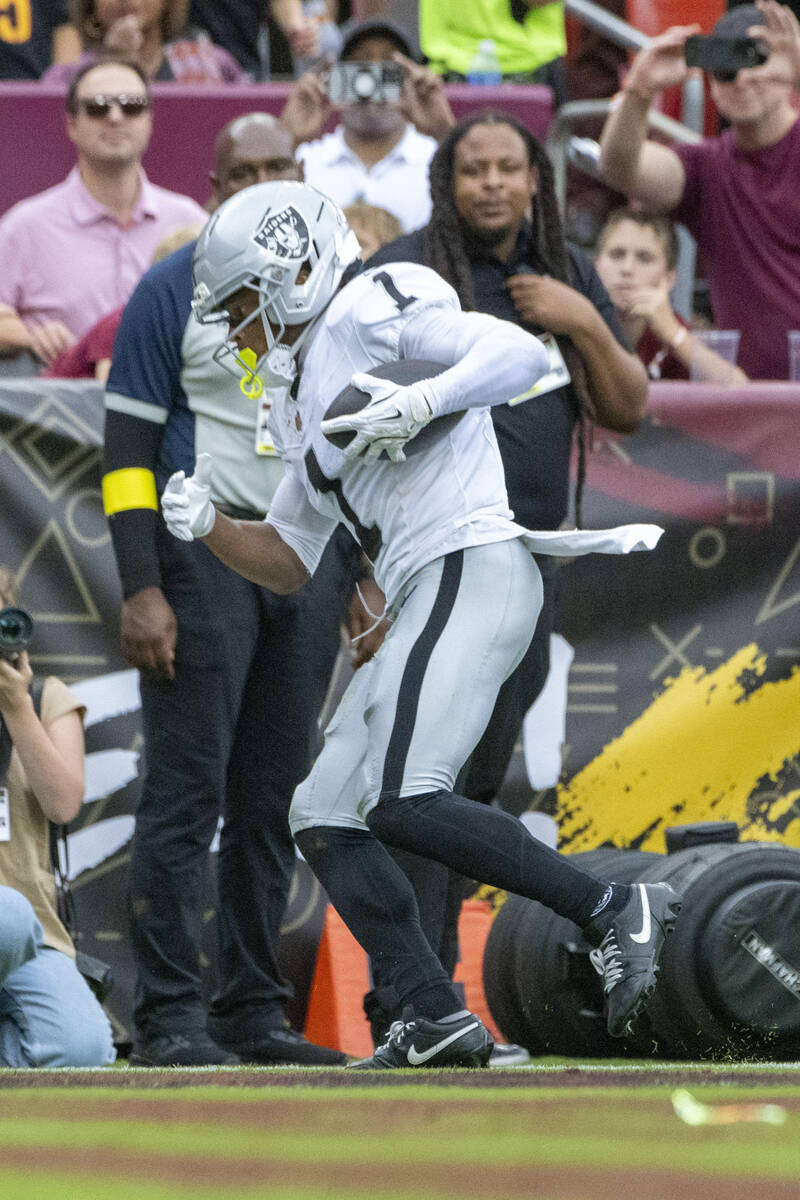 Raiders wide receiver Tre Tucker (1) runs into the end zone for a touchdown during the first ha ...