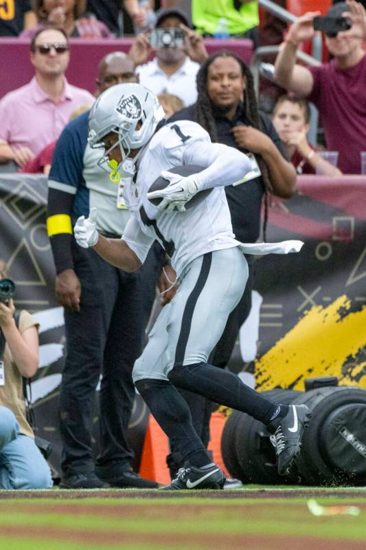 Raiders wide receiver Tre Tucker (1) runs into the end zone for a touchdown during the first ha ...