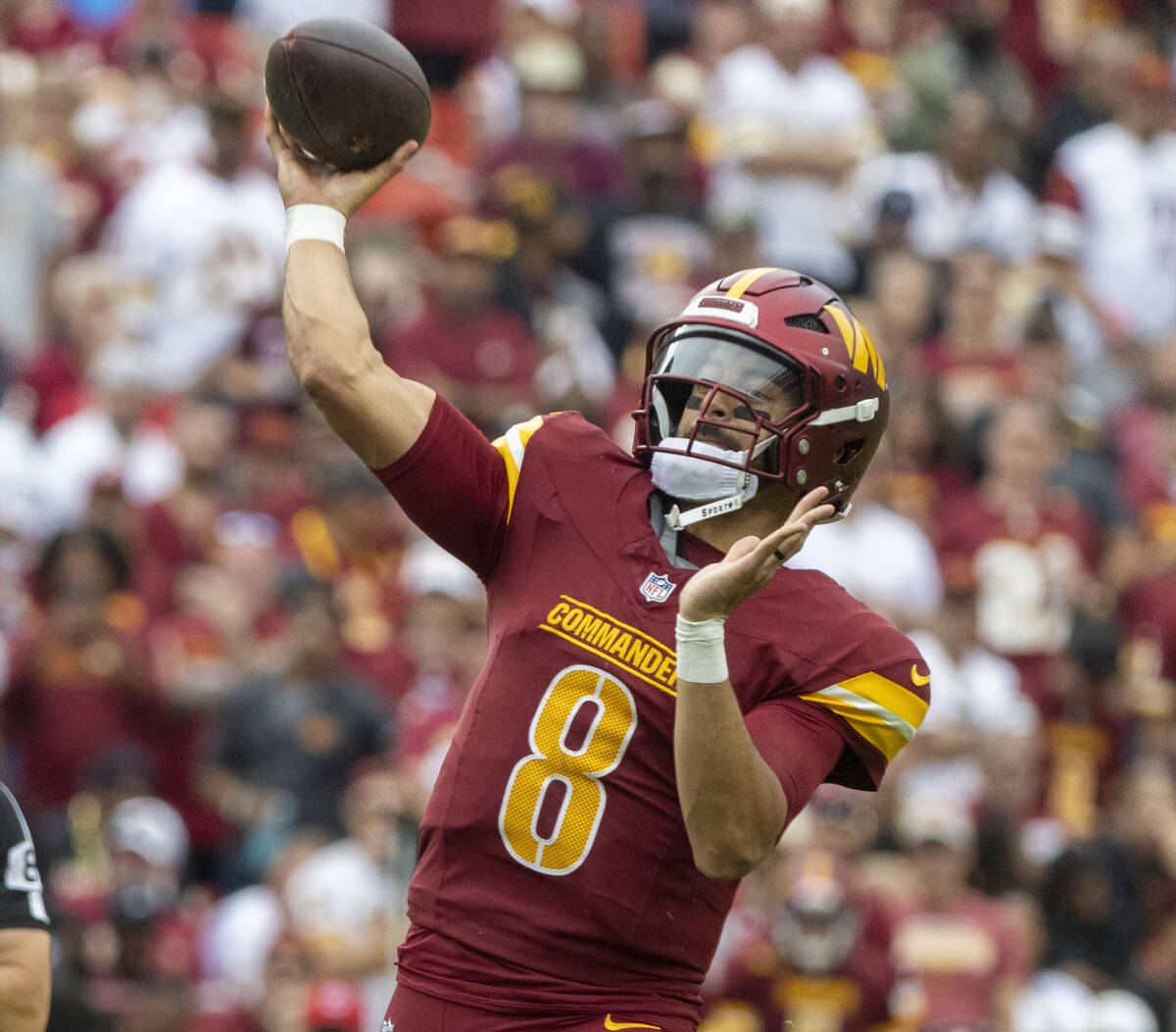 Washington Commanders quarterback Marcus Mariota (8) makes a throw against the Raiders during t ...