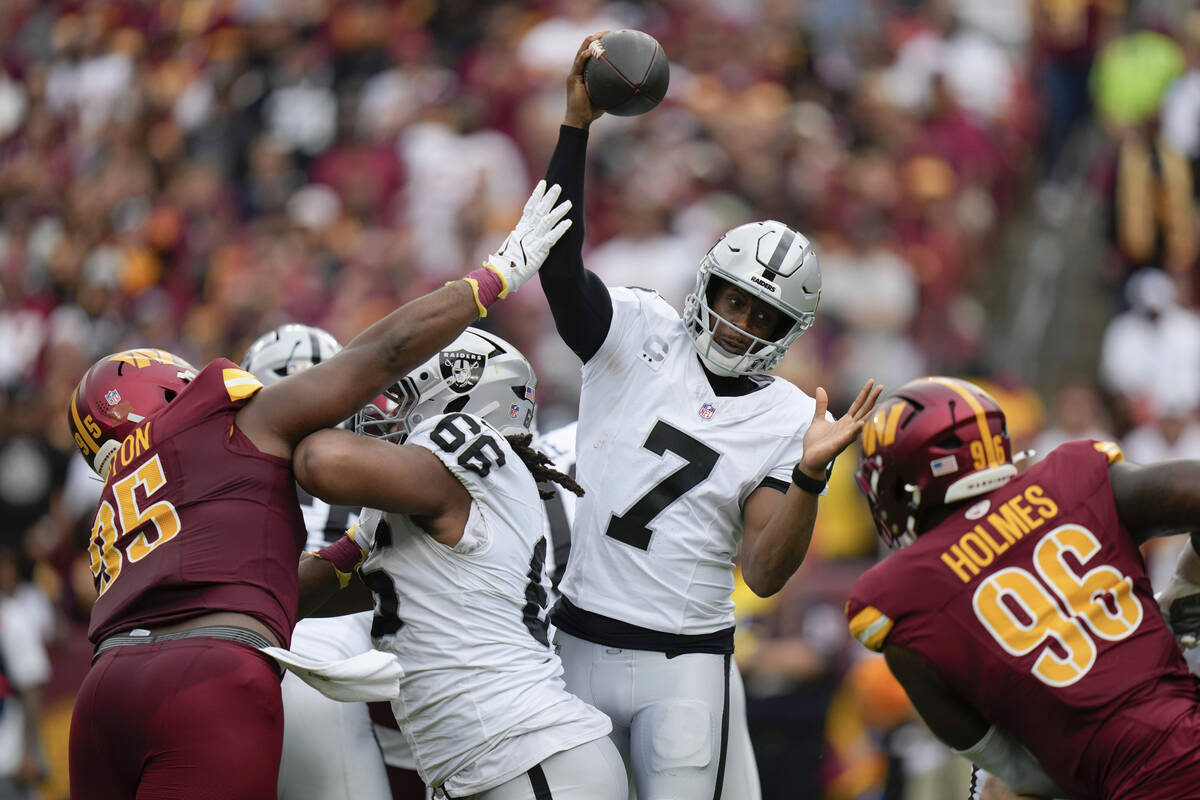 Las Vegas Raiders quarterback Geno Smith (7) throws during the first half of NFL football game ...