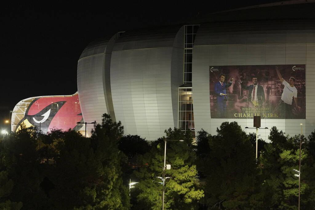 A sign is placed on side of the stadium before a memorial for conservative activist Charlie Kir ...
