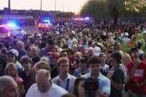 People wait in line before a memorial for conservative activist Charlie Kirk Sunday, Sept. 21, ...