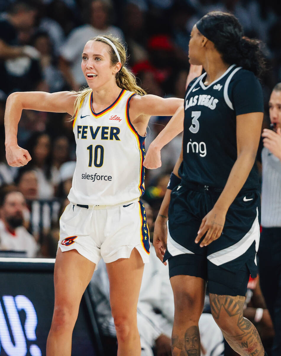 Indiana Fever guard Lexie Hull (10) hypes up the Indiana Fever bench during game one of a round ...