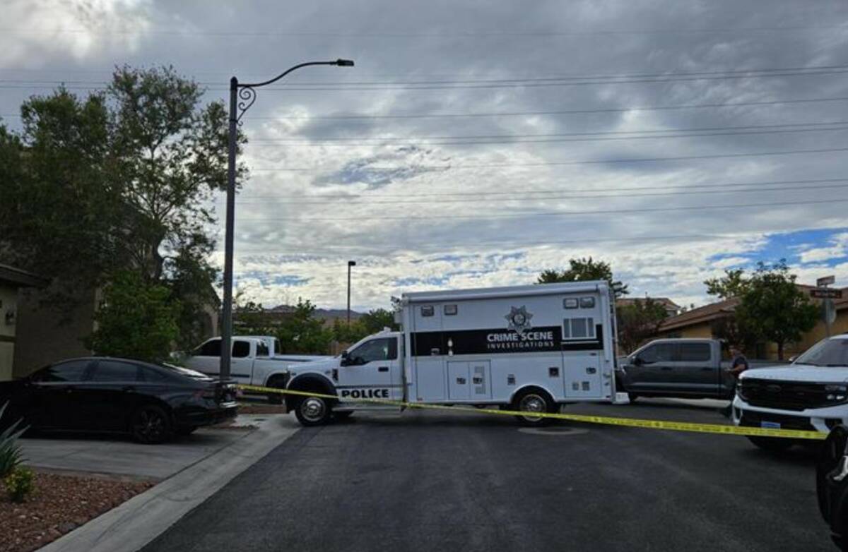 Metropolitan Police Department officials investigate a homicide following a domestic altercatio ...