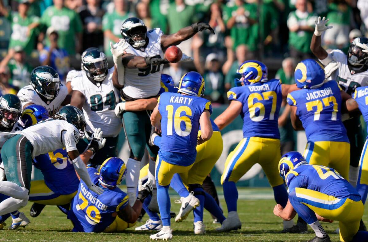 Philadelphia Eagles defensive tackle Jordan Davis (90) blocks a field goal attempt by Los Angel ...