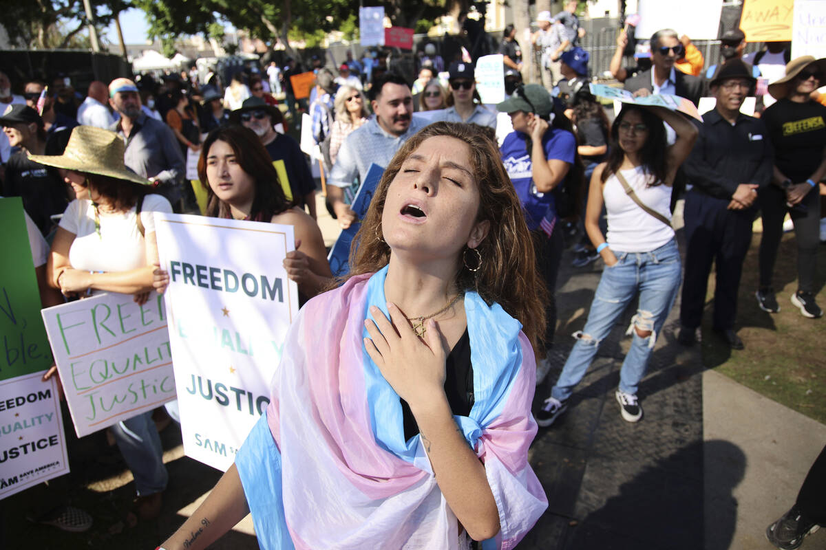 Supporters gather during an immigration rally on Saturday, Sept. 20, 2025, in Los Angeles. (AP ...