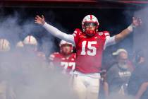 Nebraska's Dasan McCullough runs out of the tunnel before an NCAA college football game a ...