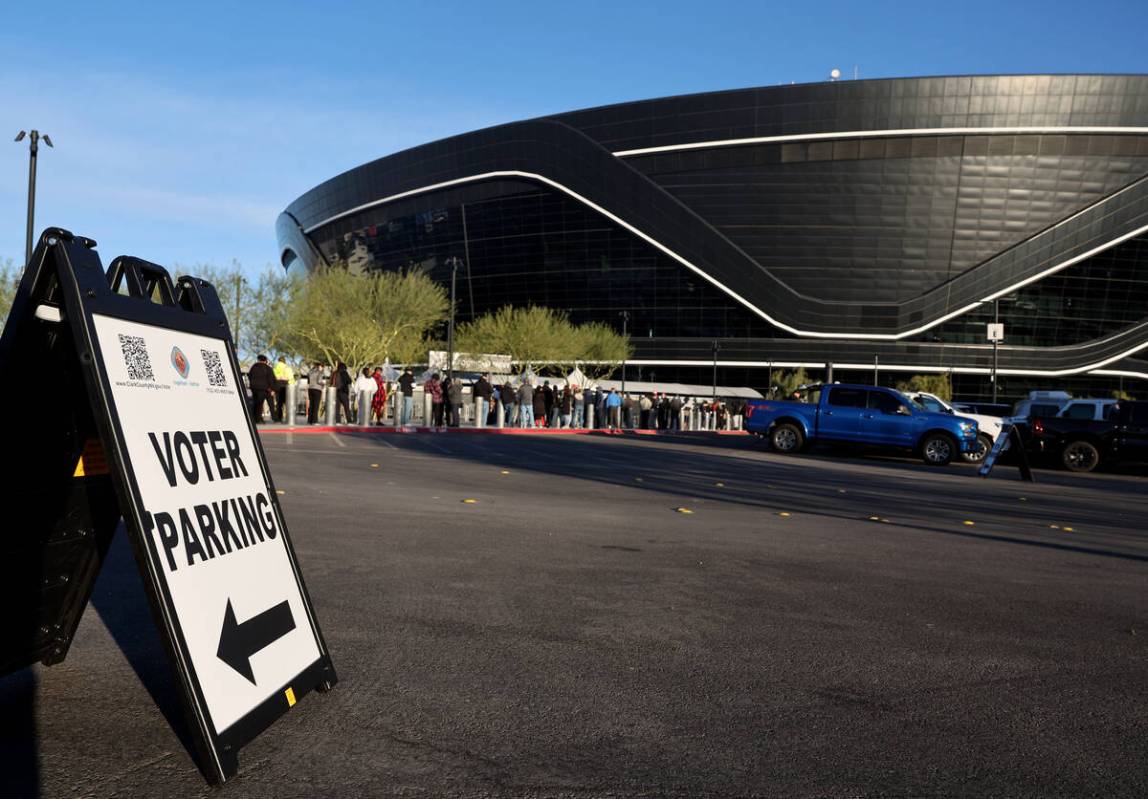People line up to vote at the Allegiant Stadium poling place in Las Vegas on Nov. 5, 2024. (K.M ...