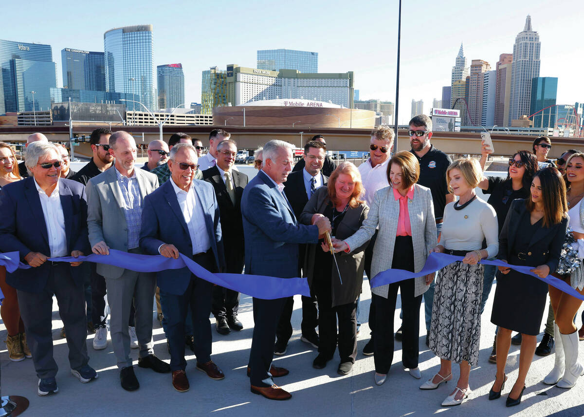 From left, Clark County Commission Chair Tick Segerblom, RTC Chair Justin Jones, Commissioner J ...