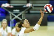Bishop Gorman's Ayanna Watson dinks the ball during their home matchup with Shadow Ridge o ...