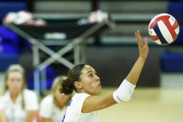 Bishop Gorman's Ayanna Watson dinks the ball during their home matchup with Shadow Ridge o ...