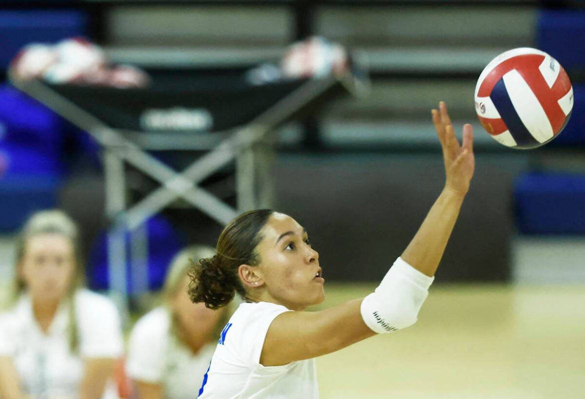 Bishop Gorman's Ayanna Watson dinks the ball during their home matchup with Shadow Ridge o ...