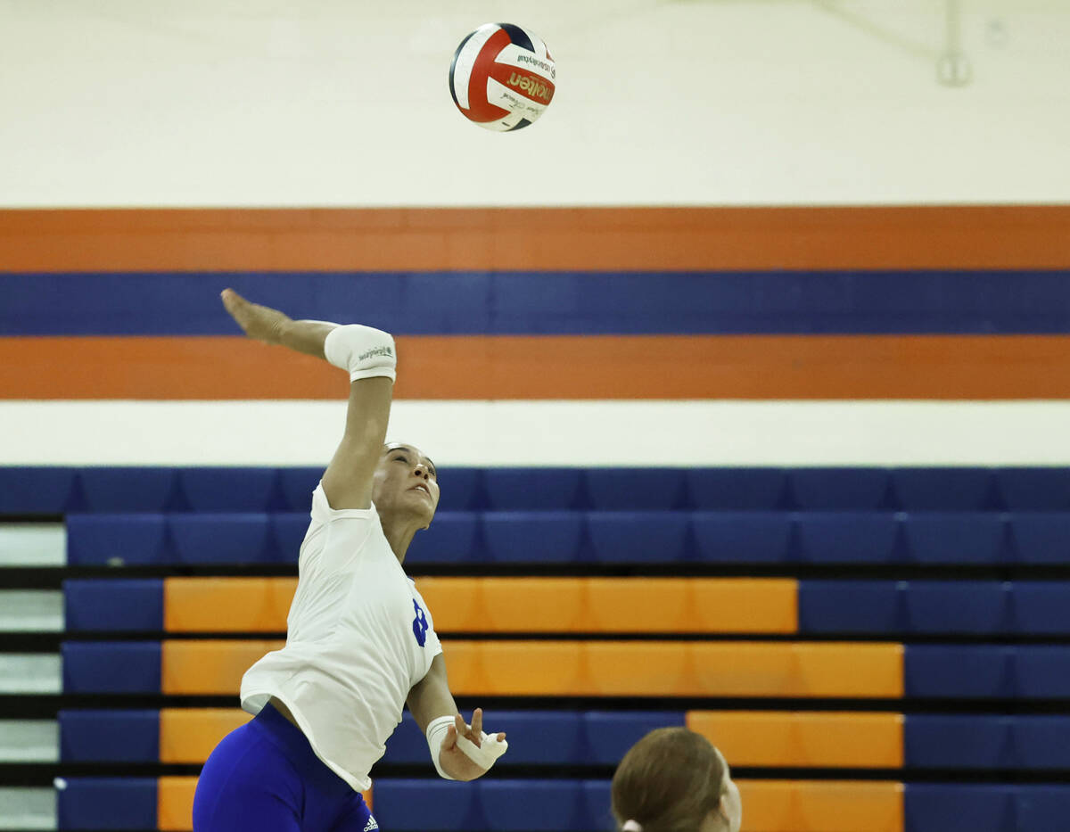 Bishop Gorman's Ayanna Watson (8) makes a kill during their home matchup with Shadow Ridge ...