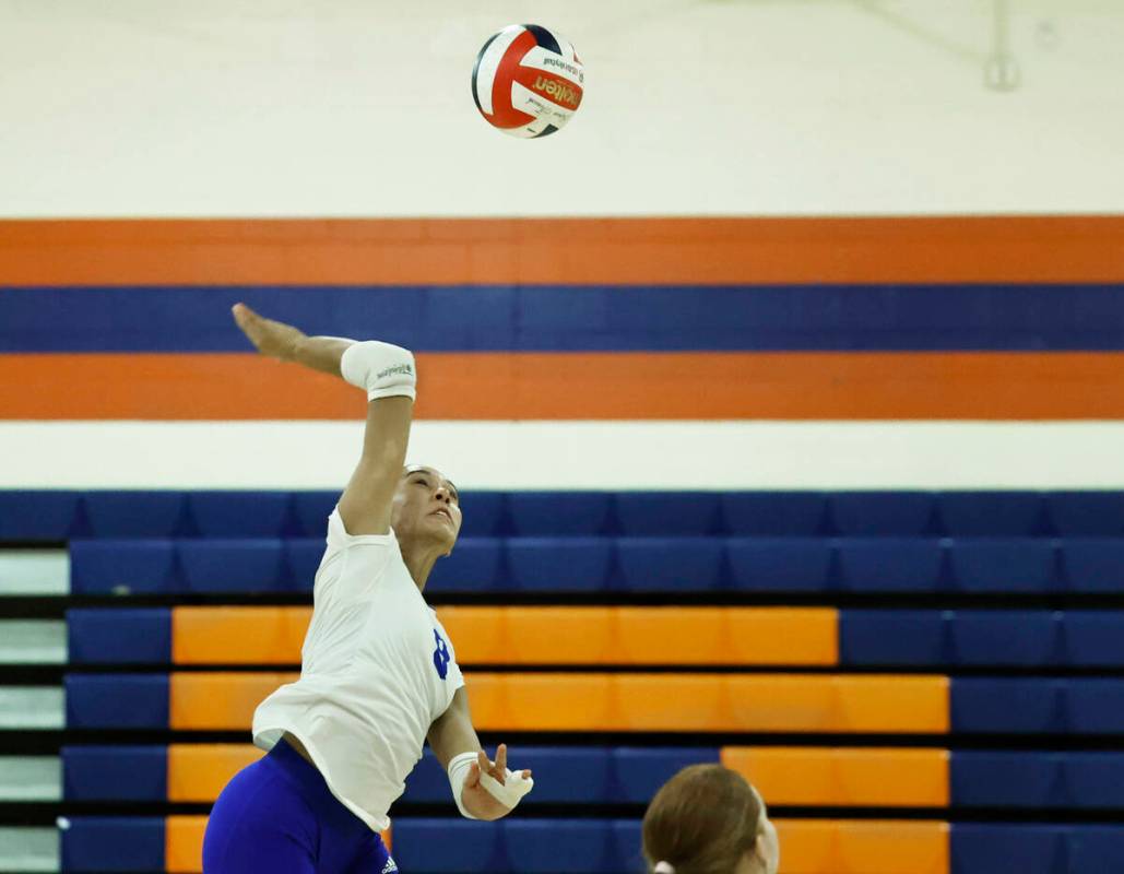 Bishop Gorman's Ayanna Watson (8) makes a kill during their home matchup with Shadow Ridge ...
