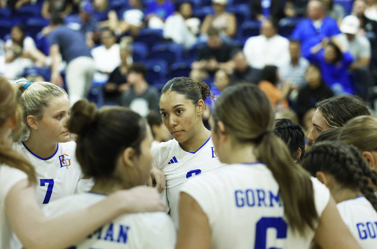 Bishop Gorman's Ayanna Watson (8) interacts with teammates during a timeout during their h ...