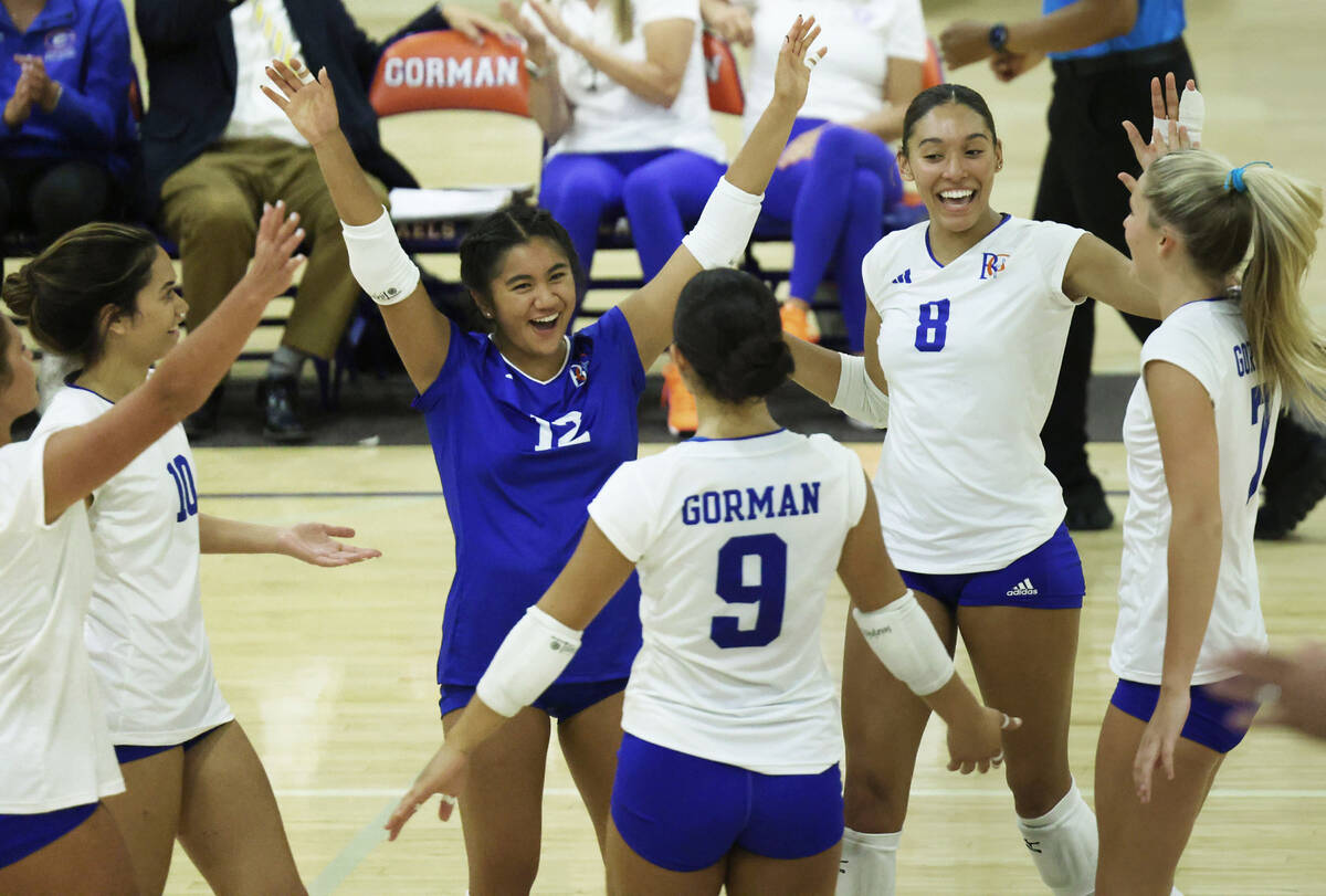 Bishop Gorman's Ayanna Watson (8) celebrates with teammates during their home matchup with ...