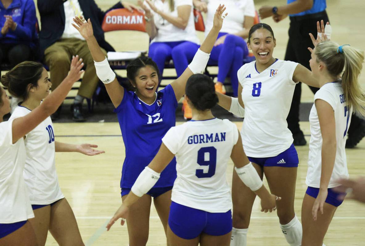 Bishop Gorman's Ayanna Watson (8) celebrates with teammates during their home matchup with ...