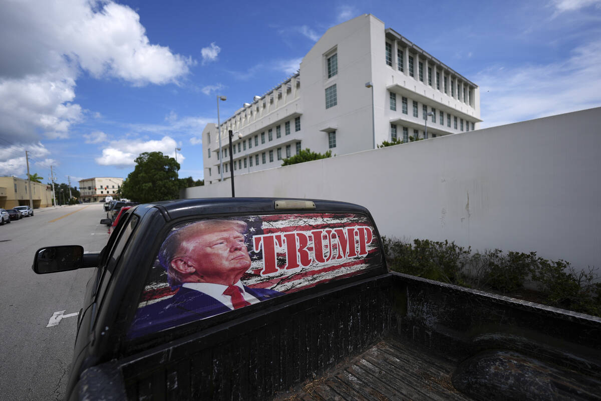 A pickup truck decorated in support of President Donald Trump sits parked outside the Alto Lee ...