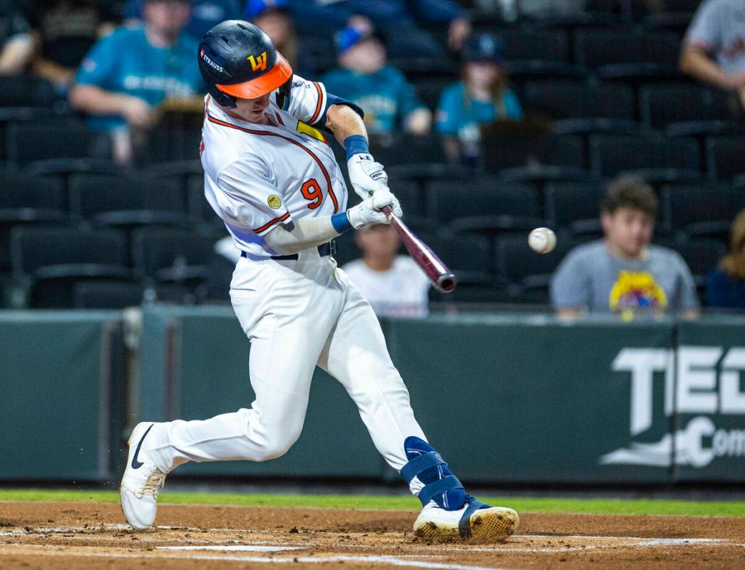 Aviators infielder Cooper Bowman (9) connects with a Tacoma Rainiers pitch during Game 1 of the ...
