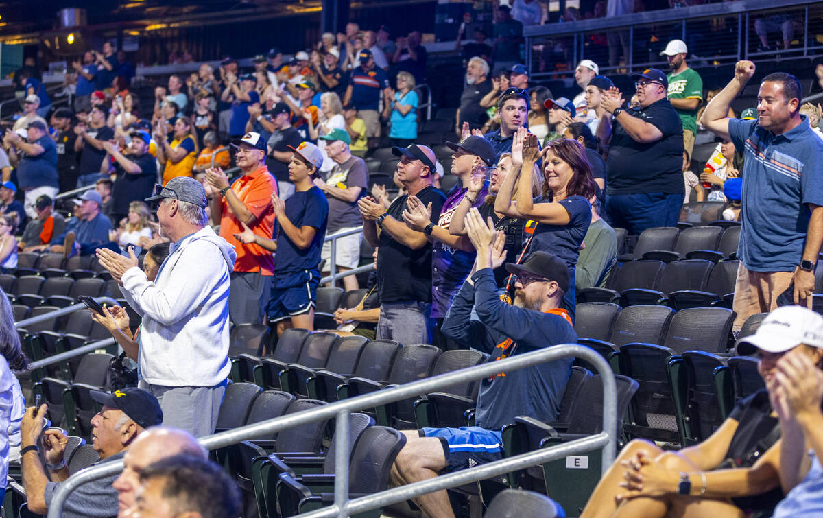 Aviators fans applaud another score against the Tacoma Rainiers during Game 1 of the Pacific Co ...