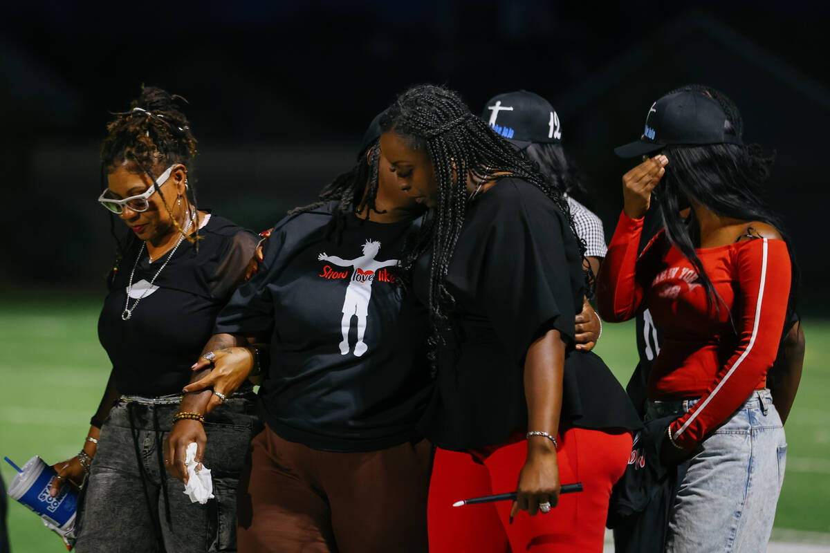 Family members arrive for a vigil in Jovonn “JoJo” Magee-Thomas' honor on Wednesday, Sept. ...