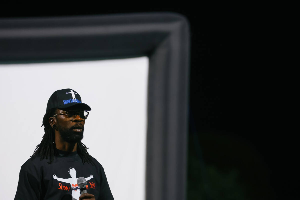 Jovonn “JoJo” Magee-Thomas' father, Tyron Thomas, speaks during a vigil in his son’s hono ...