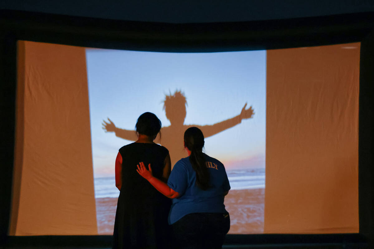 A memorial video plays during a vigil in Jovonn “JoJo” Magee-Thomas' honor on Wednesday, Se ...