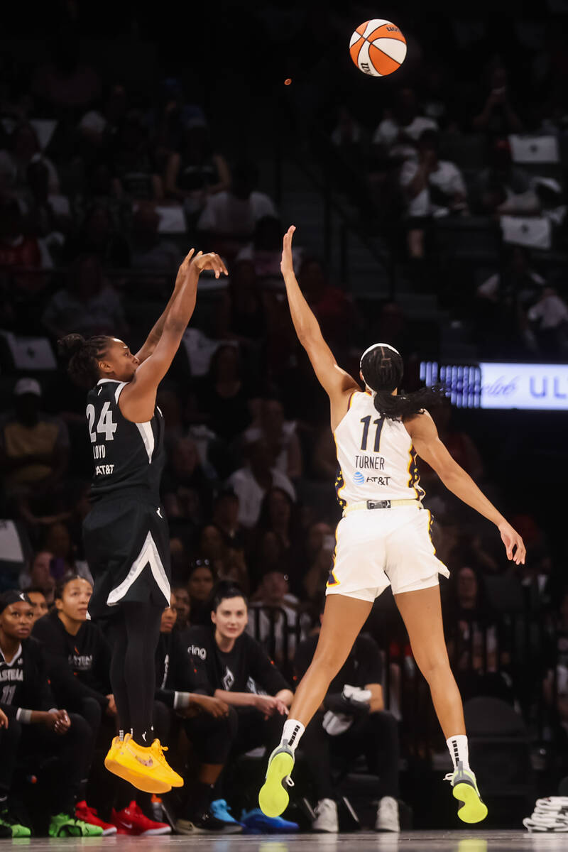 Aces guard Jewell Loyd (24) shoots over Indiana Fever forward Brianna Turner (11) during the fi ...