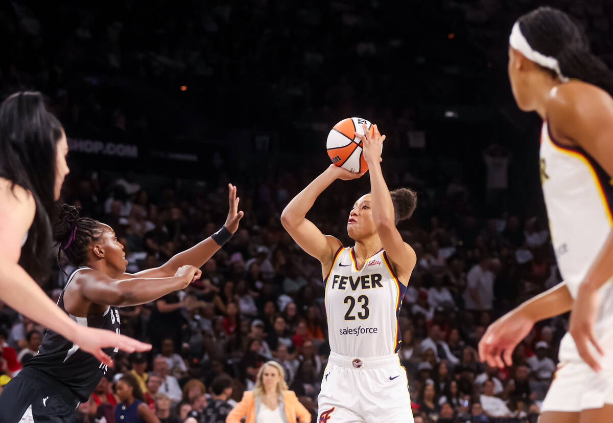 Indiana Fever guard Aerial Powers (23) shoots against the Aces during the first half of Game 2 ...