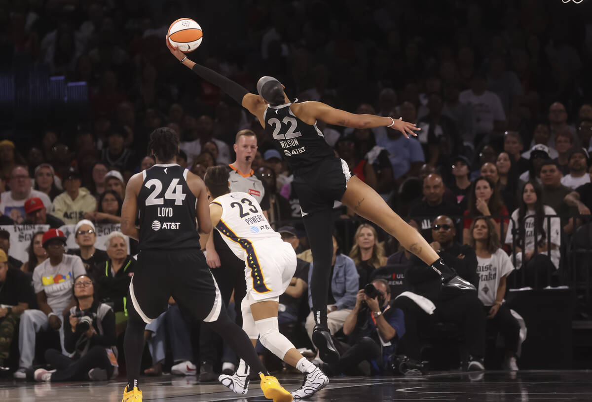Aces center A'ja Wilson (22) grabs a rebound against the Indiana Fever during the second h ...