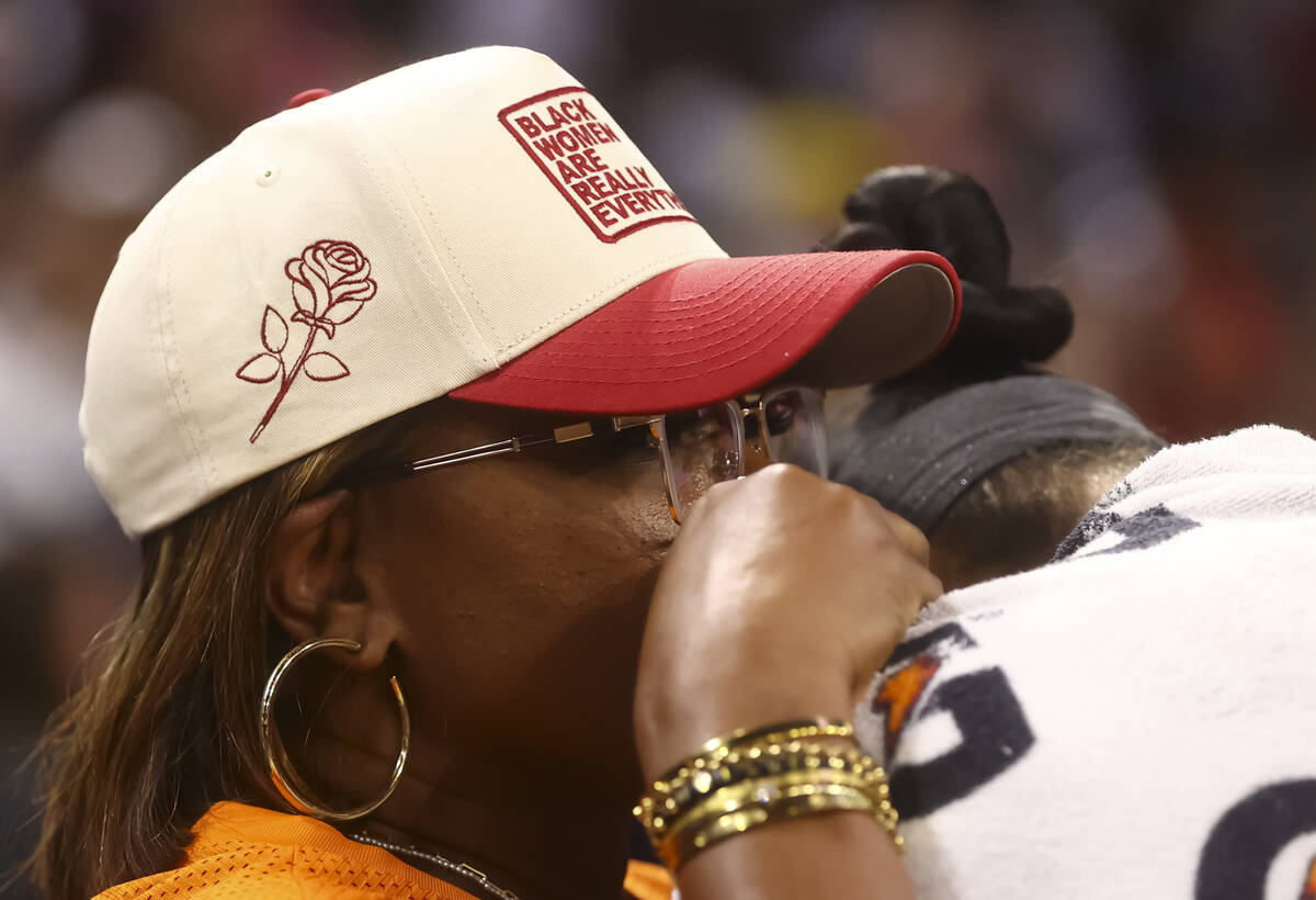 WNBA legend Sheryl Swoopes, left, talks with Aces center A'ja Wilson (22) after the Aces d ...