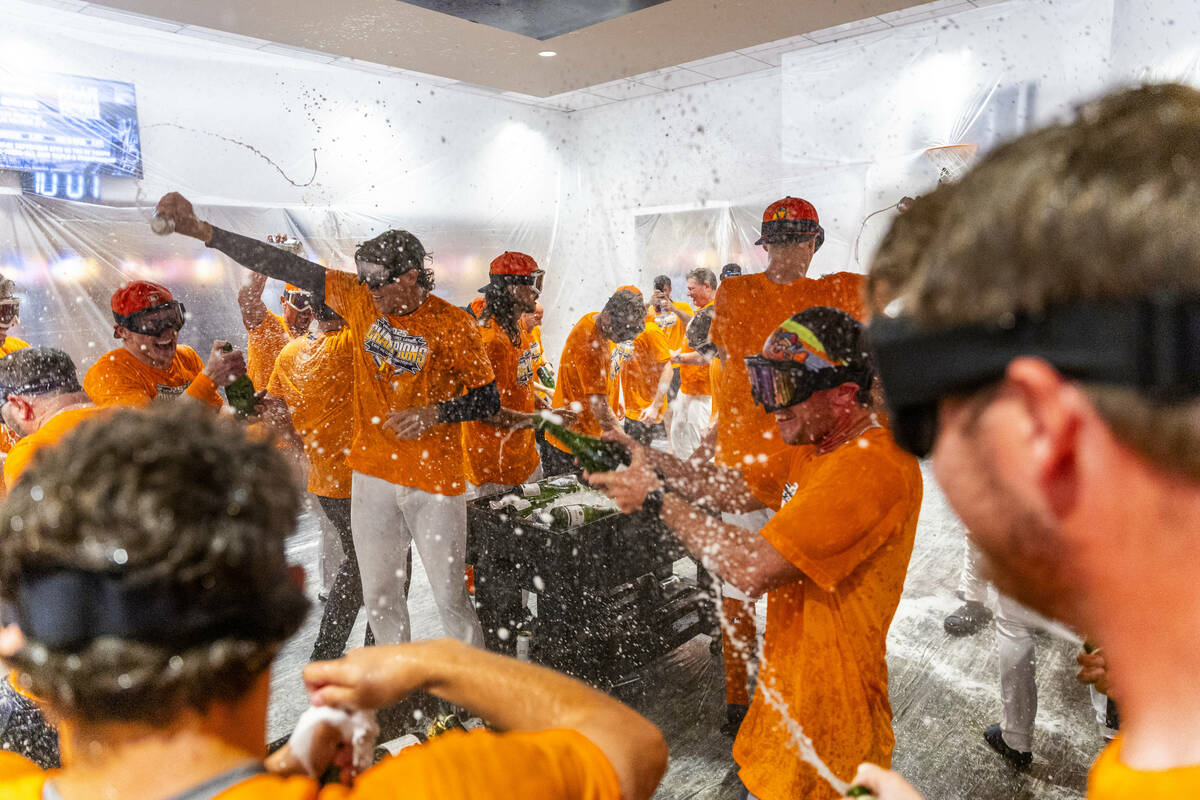 The Aviators enjoy a champagne shower as they celebrate their win over the Tacoma Rainiers 7-3 ...
