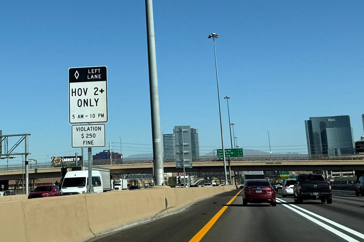 An HOV sign displays inaccurate regulation hours on Interstate 15 northbound near Hacienda Aven ...