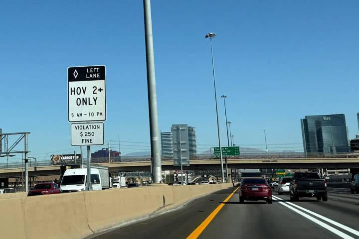 An HOV sign displays inaccurate regulation hours on Interstate 15 northbound near Hacienda Aven ...
