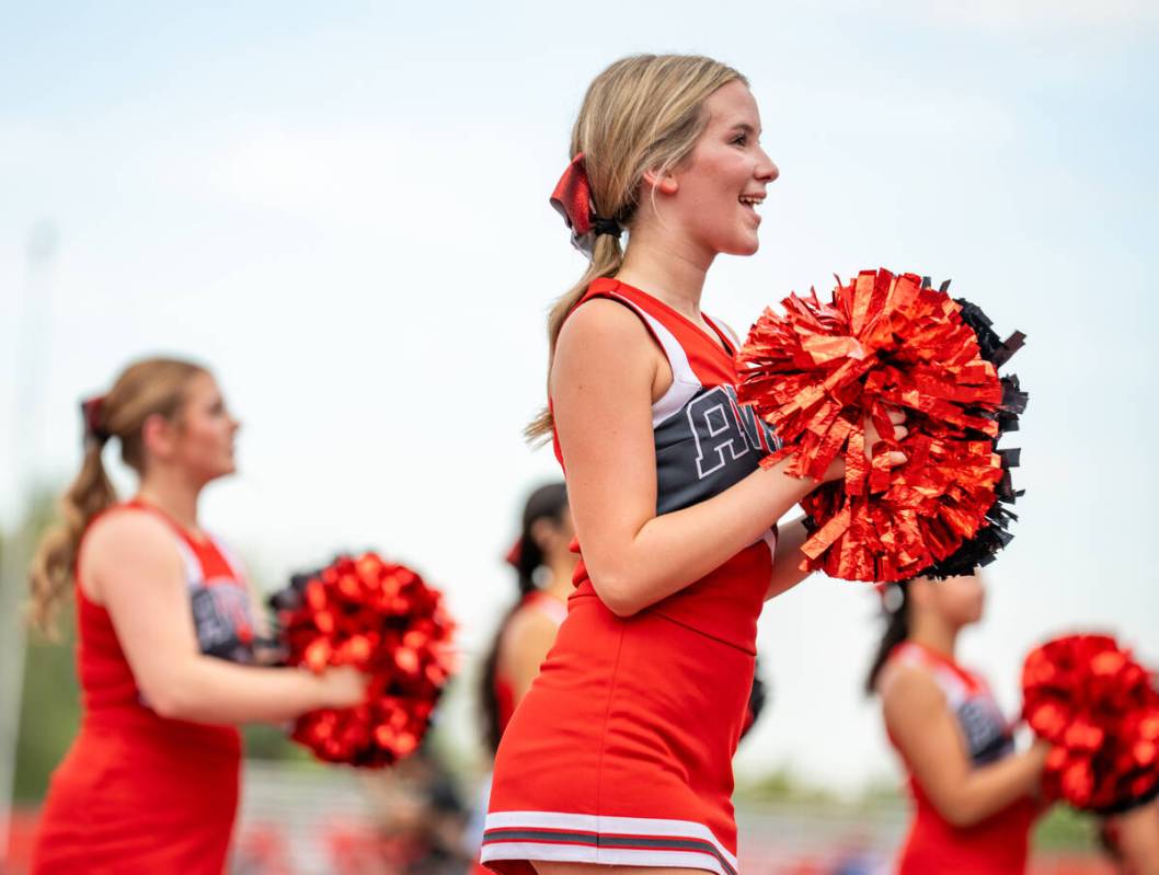 Aggie cheerleaders cheer during a football game between Mililani and Arbor View at Arbor View H ...