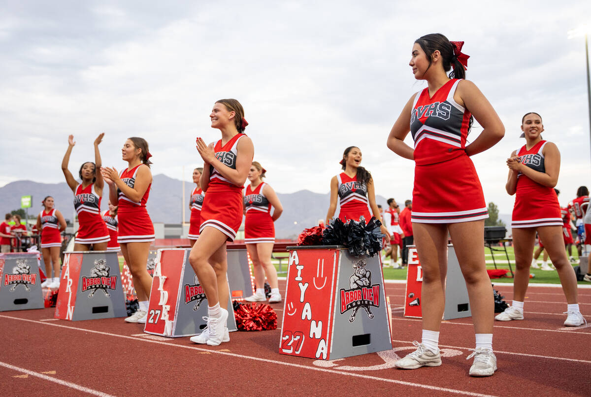 Aggie cheerleaders cheer during a football game between Mililani and Arbor View at Arbor View H ...