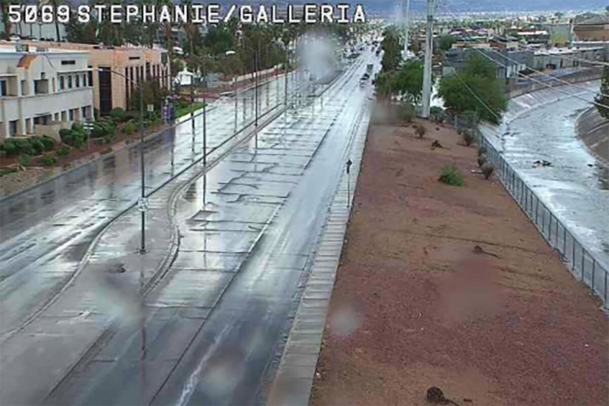 Rainfall is seen Thursday, Sept. 25, 2025, at Galleria Drive and North Stephanie Street in Hend ...